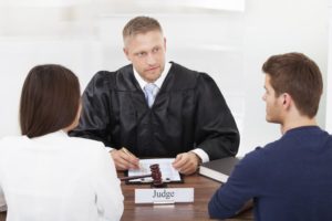 A married couple in front of a judge in Henderson, NV to have a divorce.